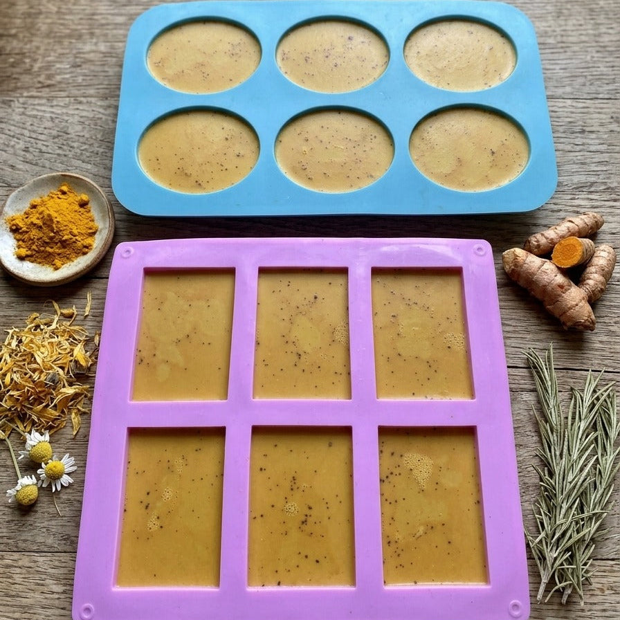 Elixoria Herbs turmeric handmade soap in an oval shape with tiny turmeric particles, presented in a premium botanical setting for skincare.